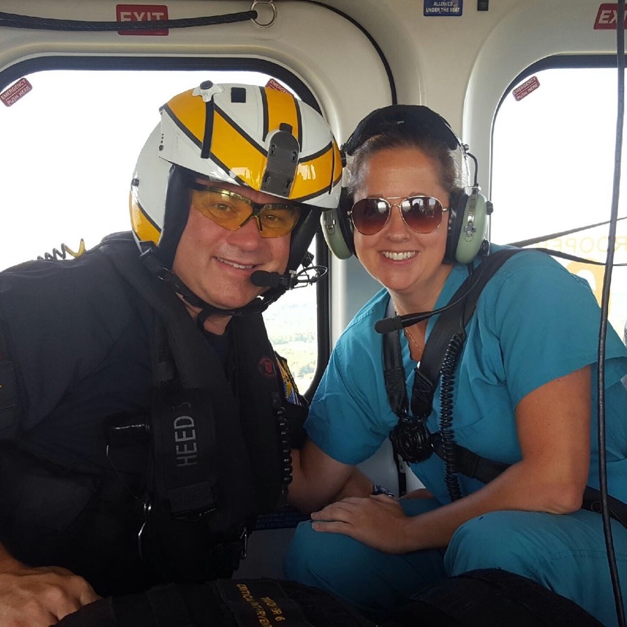 Leah and Jeremy in a medevac helicopter